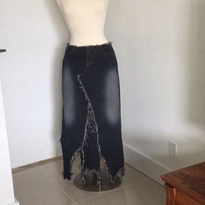 Long distressed Denim skirt.